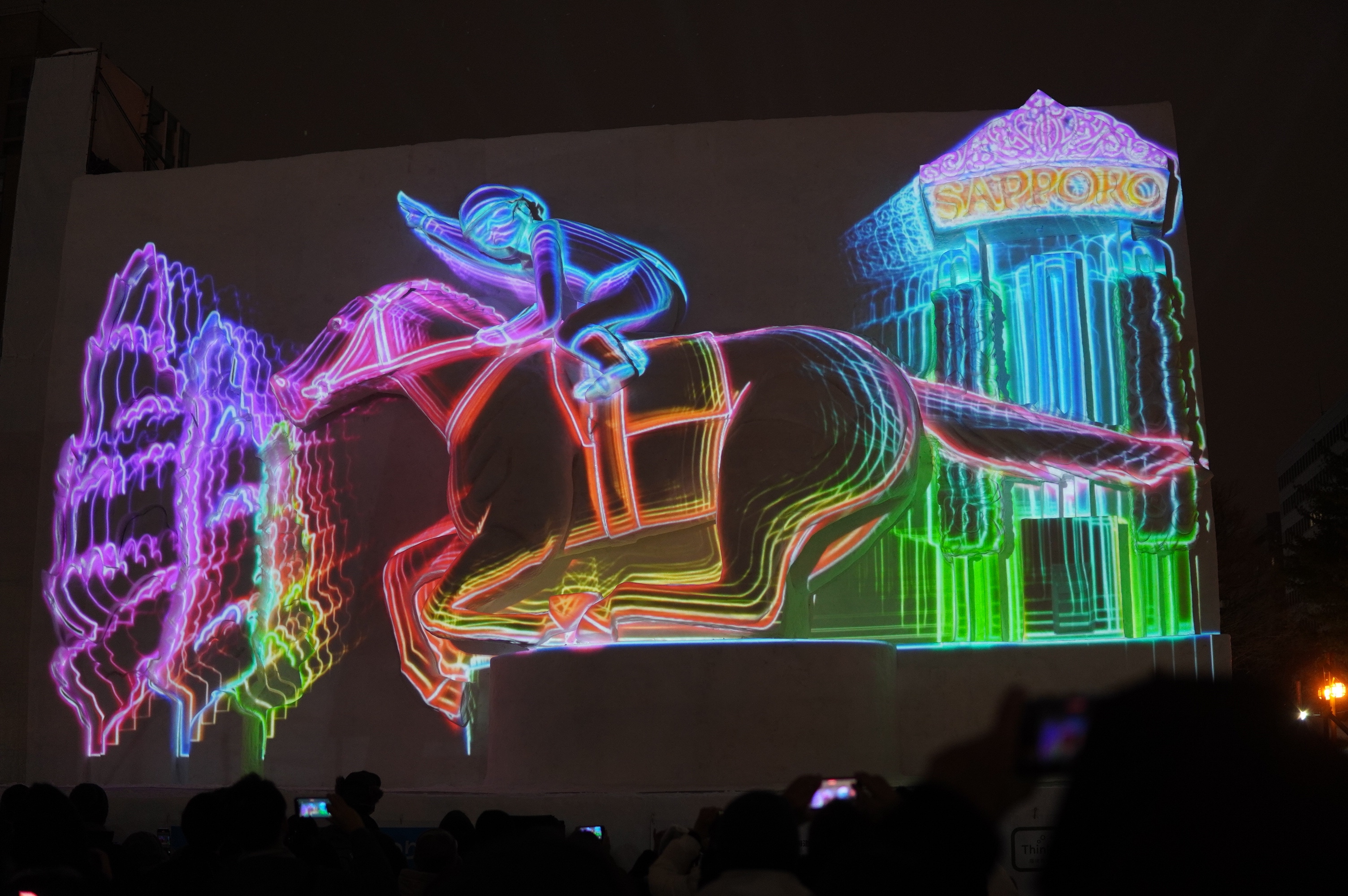 Schneekunst beleuchtetes Pferdewetten Kunstwerk